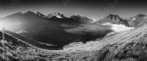Black and white fine art summer view of the Alps with Mont Blanc (Monte Bianco) on background, Chamonix location. Beautiful outdoor scene in Vallon de Berard Nature Reserve, Graian Alps, France Europe