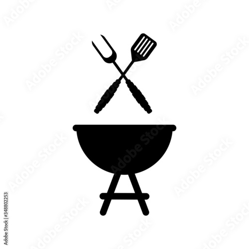Barbecue grill with fork and spatula
