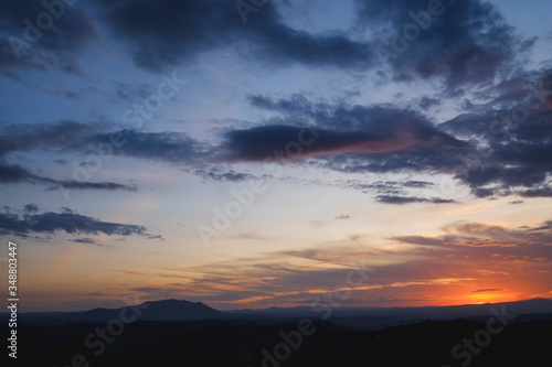 Cloudy sky at sunset over Monte Soratte, italy © andrea