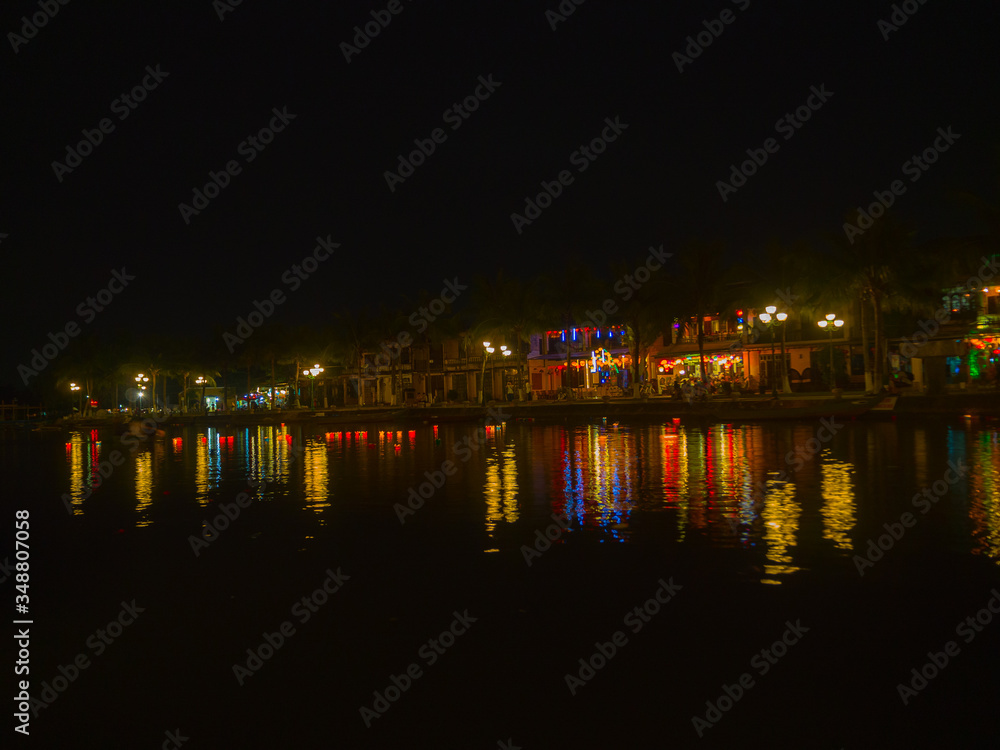 Night view of Hoian city reflection in the river in Hoi AN, Vietnam