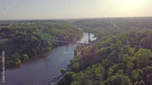 Aerial view of a foot bridge in the city of Zhytomyr, Ukraine over the Teterev River photo