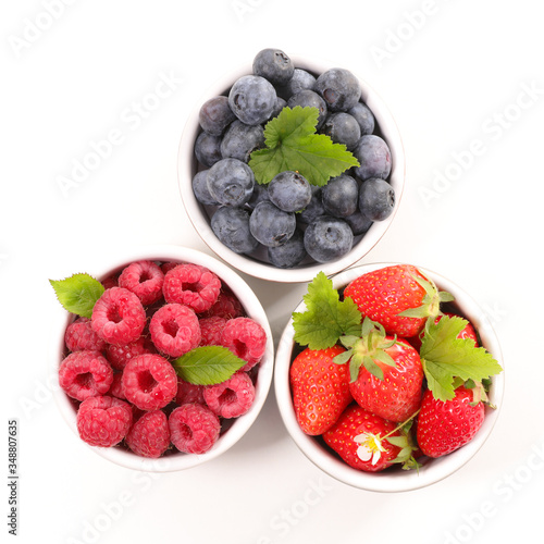 assorted of berry fruit- blueberry, strawberry and raspberry isolated on white background