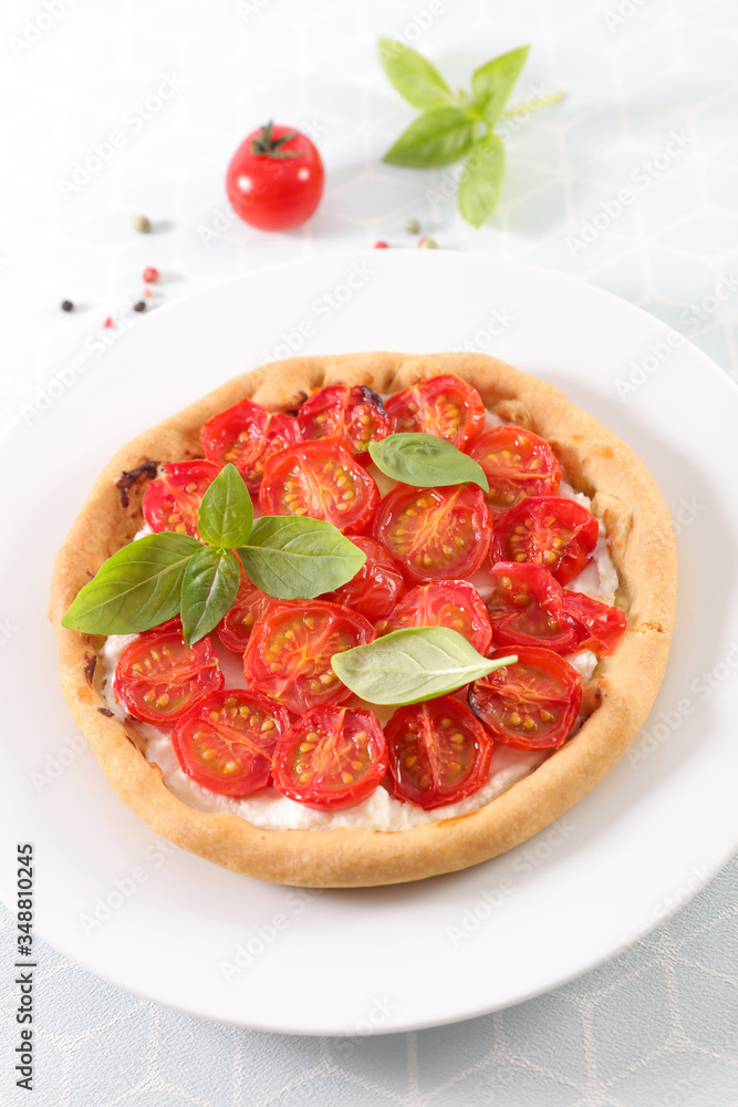 plate of tomato quiche with basil plate of tomato quiche with basil