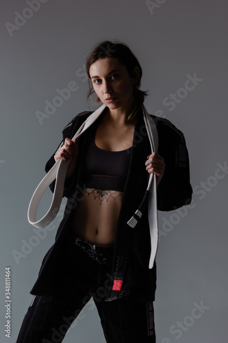 Brazilian jiu jitsu woman athlete in kimono