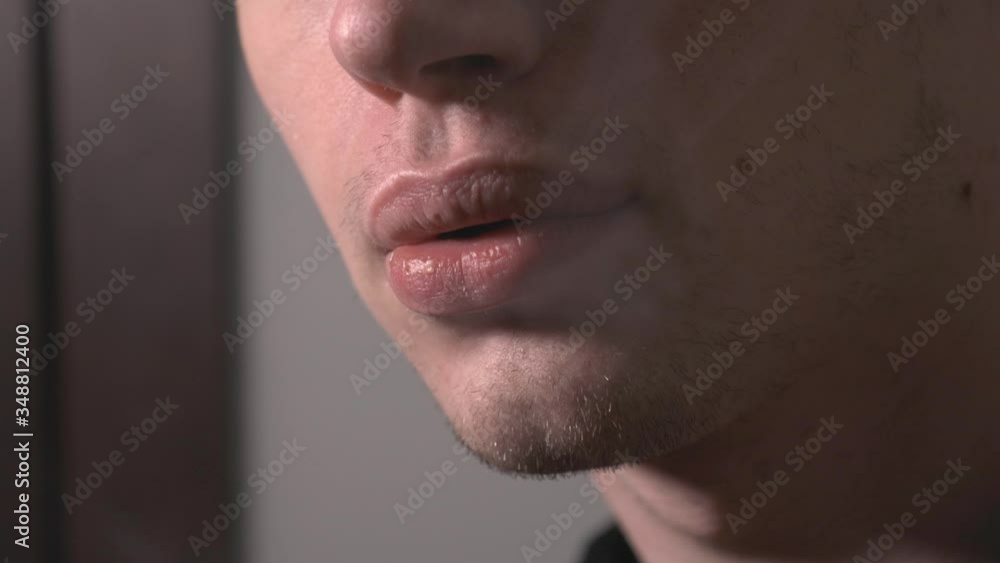 Man Vaping With An Electronic Cigarette - Medium Shot Man Vaping With An Electronic Cigarette - Medium Shot