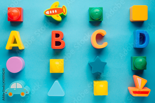 letters abcd on a blue background. layout. children's background