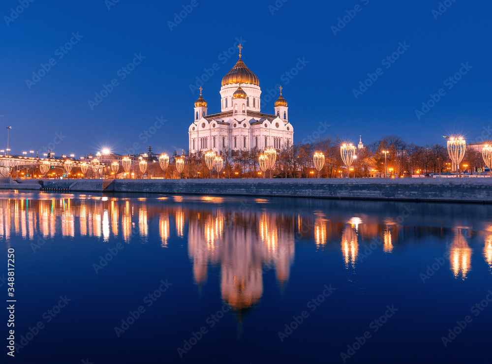 Cathedral of Christ the Savior and its reflection in the river. New Year's night illumination of the city