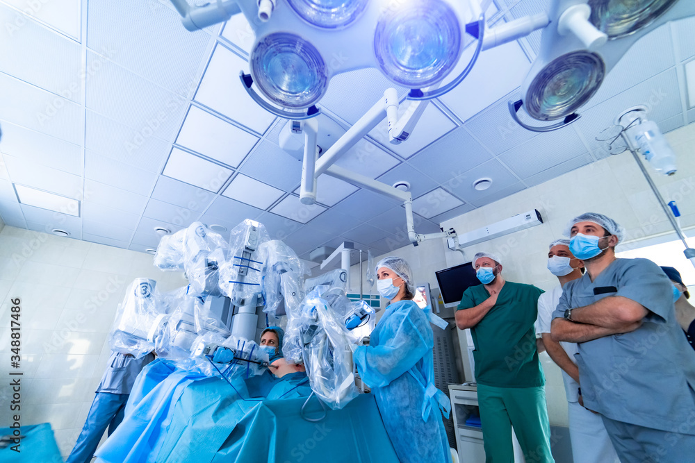Modern surgical system. Medical robot. Minimally invasive robotic Da Vinci Surgery. Stock Photo | Adobe Stock