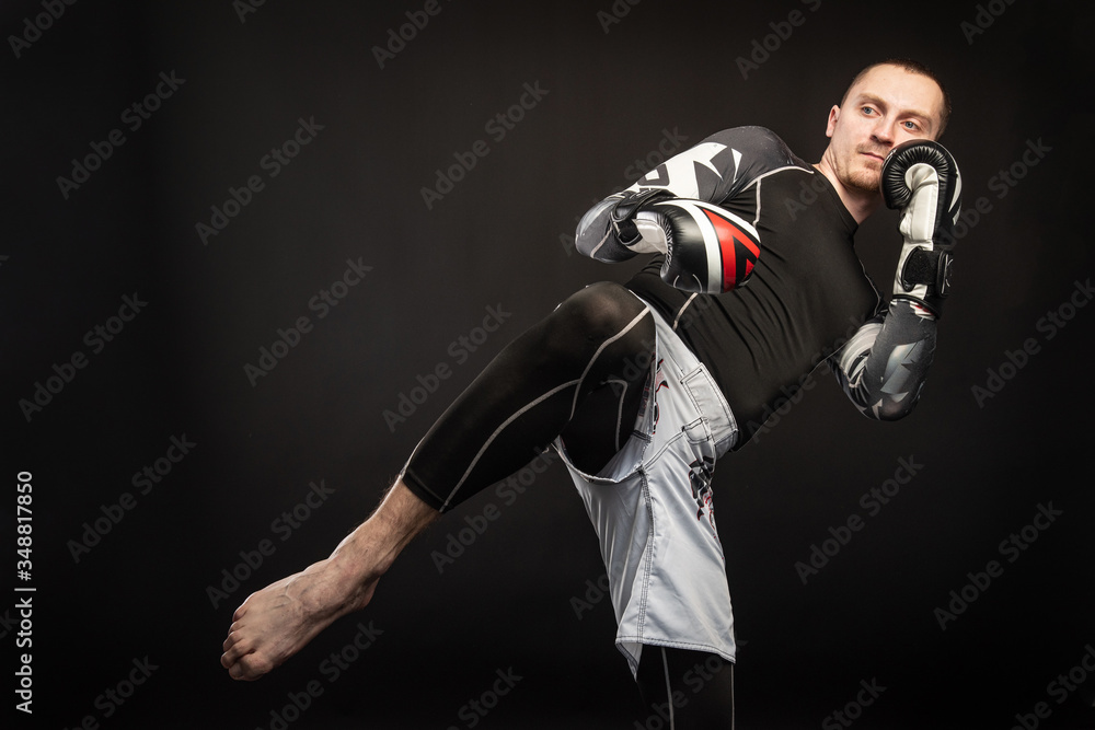 Mixed Martial Arts Fighter Against Dark Background Mixed Martial Arts Fighter Against Dark Background