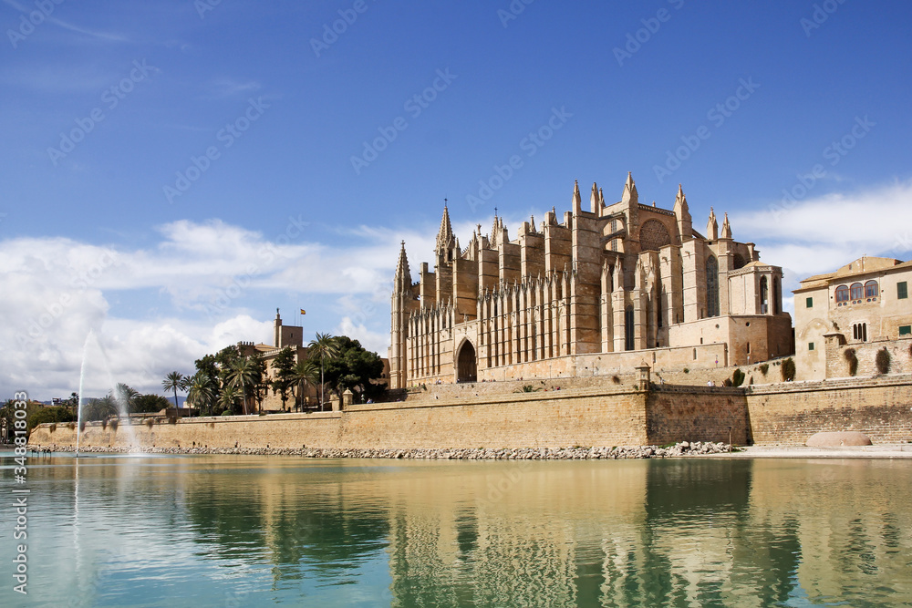 Cathedral of Majorca with reflection on the river, Spain