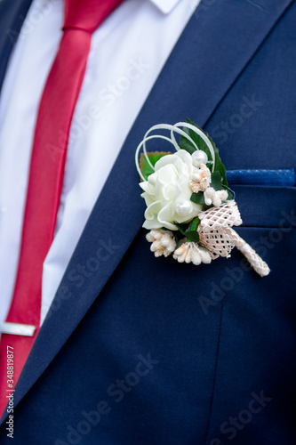 boutonniere on the groom's jacket