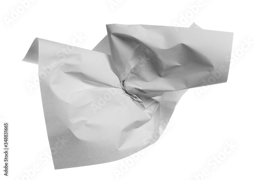 Crumpled white paper sheet isolated on white background with clipping path