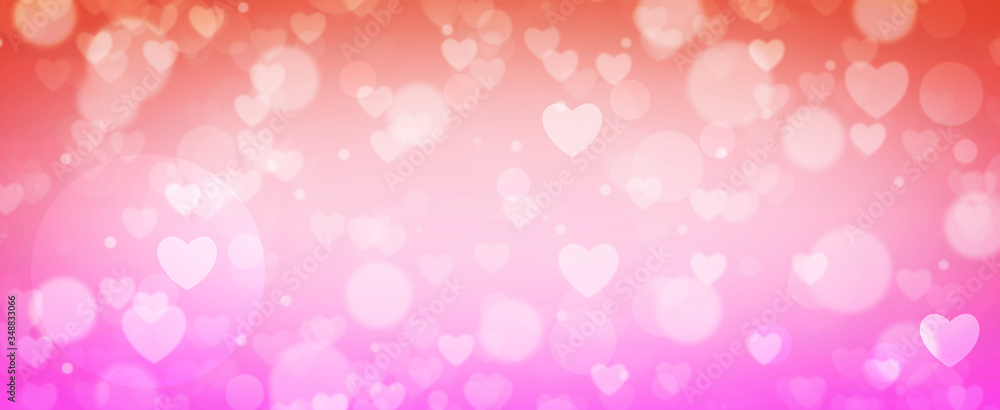 Glowing soft orange and pink bokeh background. Spring concept. Blurred bokeh circles and hearth shapes. Glowing soft orange and pink bokeh background. Spring concept. Blurred bokeh circles and hearth shapes.