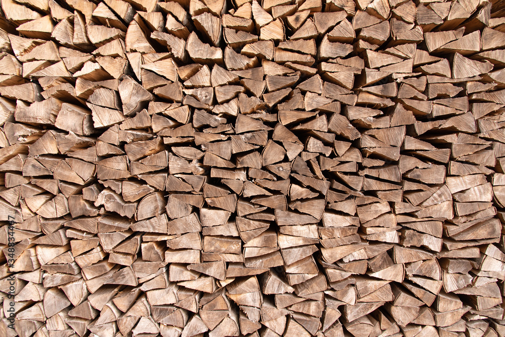 firewood stacked in a pile firewood stacked in a pile