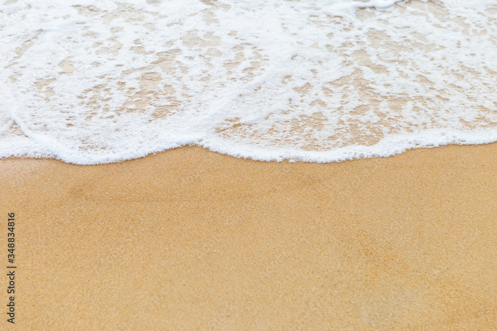White wave on empty brown sand beach, summer or tropical climate background, nature background, outdoor day light White wave on empty brown sand beach, summer or tropical climate background, nature background, outdoor day light