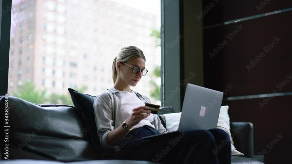 Happy young woman making money transaction online on modern laptop computer sitting at home apartment.Hipster girl doing shopping on website using credit card for payment in webstore
Happy young woman making money transaction online on modern laptop computer sitting at home apartment.Hipster girl doing shopping on website using credit card for payment in webstore