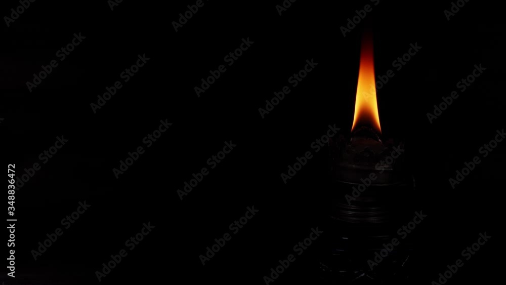 Burning wick of a kerosene lamp Stock ビデオ Adobe Stock