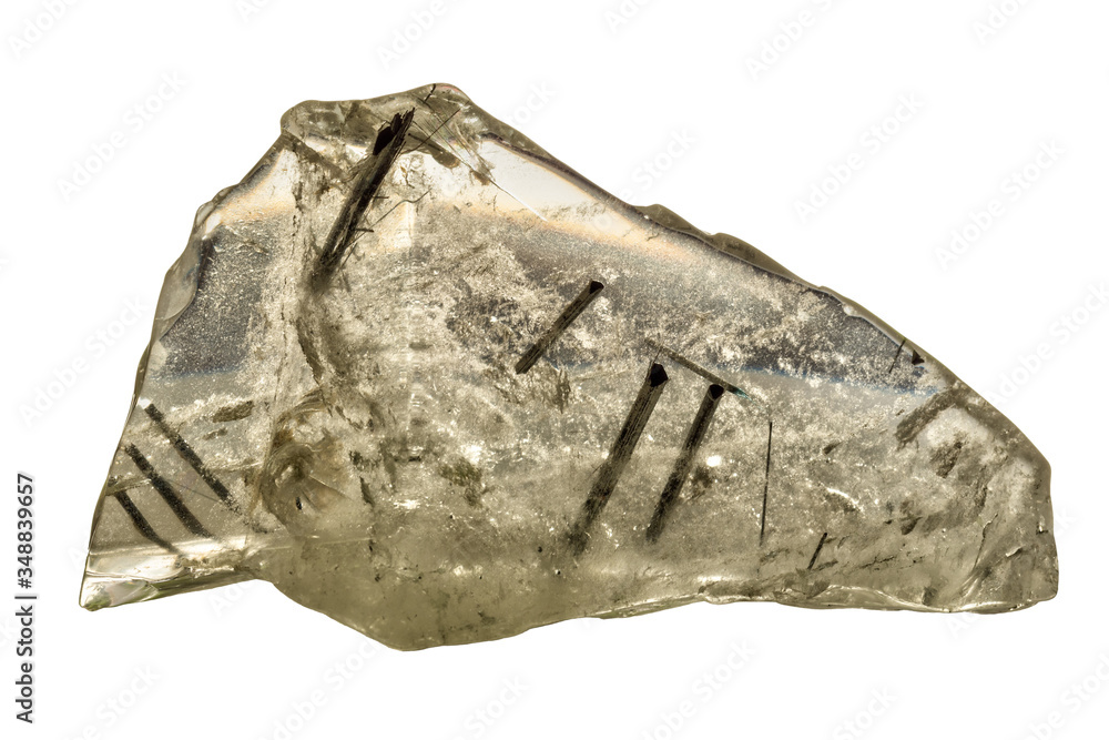 A piece of clear quartz with needles of black tourmaline in it