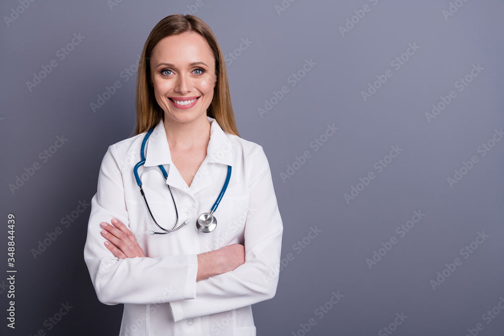 Portrait of her she nice attractive cheerful confident blonde girl doc qualified specialist expert therapist folded arms isolated over grey violet purple pastel color background Portrait of her she nice attractive cheerful confident blonde girl doc qualified specialist expert therapist folded arms isolated over grey violet purple pastel color background