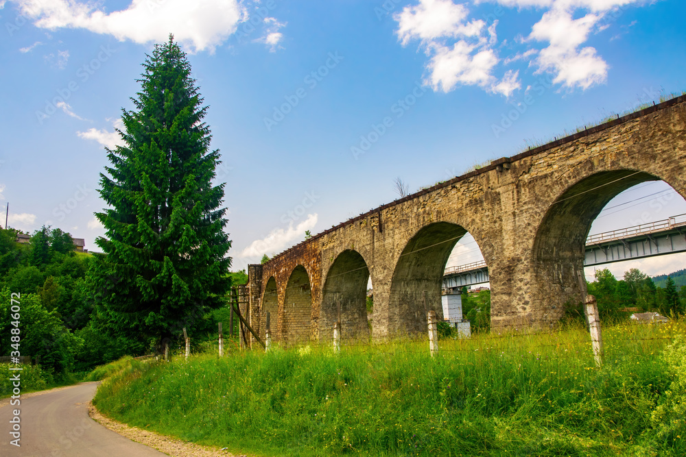 Historical abandoned railway arch bridge viaduct in Vorokhta, Ivano-Frankivsk Region, Ukraine
