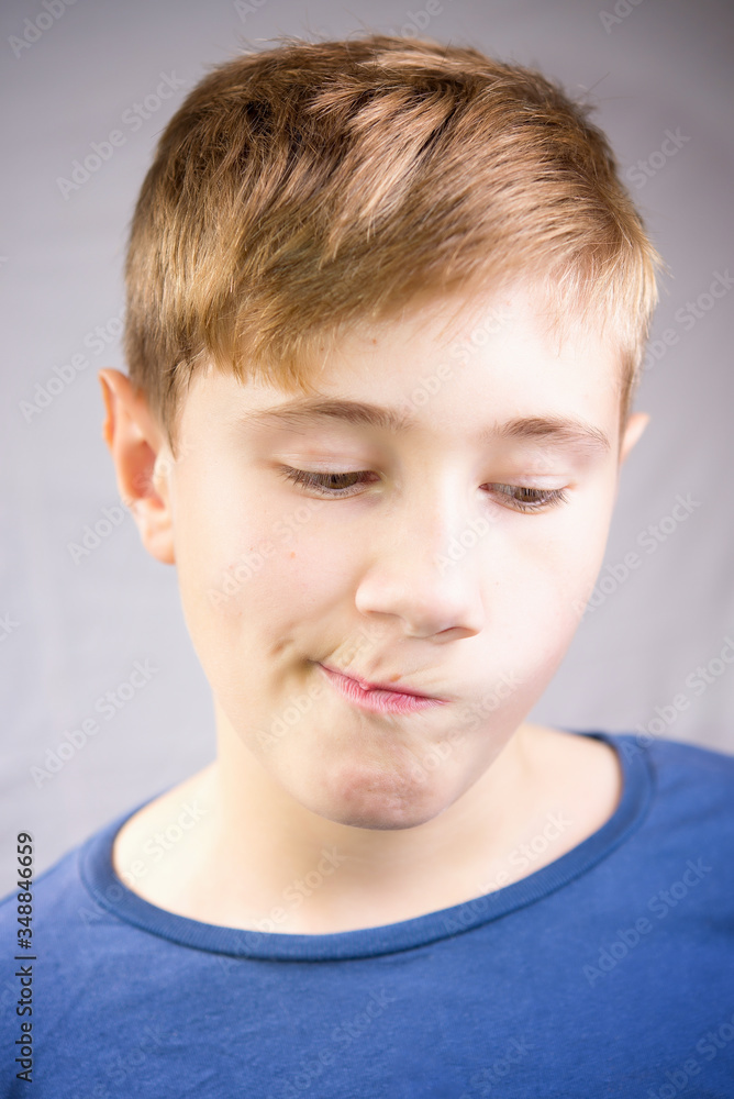 Emotional portrait of a 10-12 years boy. Emotional Portrait of sadness, depression and anxiety. Emotional portrait of a 10-12 years boy. Emotional Portrait of sadness, depression and anxiety.
