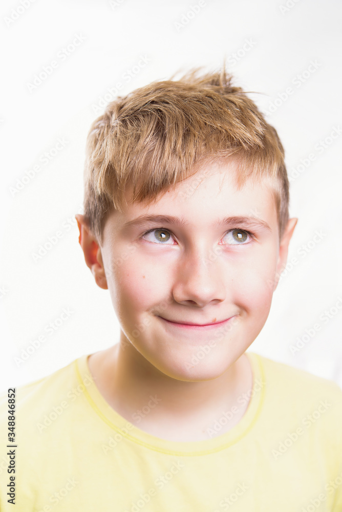 Emotional portrait of a 10-12 years boy. Emotional smiling portrait Emotional portrait of a 10-12 years boy. Emotional smiling portrait