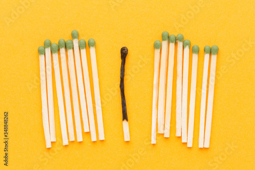 Matches collection and one burned match. Outstanding  choice and difference concept. Being unique and individuality.