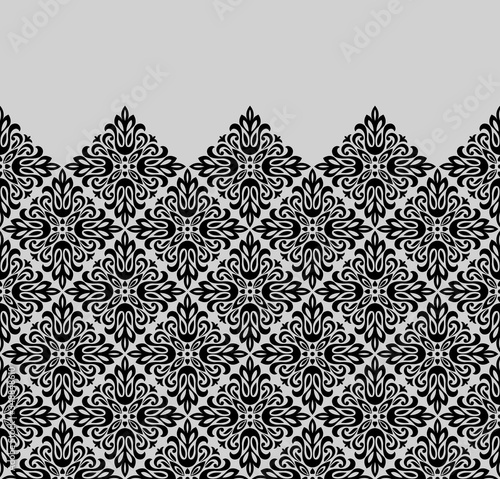 Wallpaper in the style of Baroque. Modern vector background. Black and grey floral ornament. Graphic pattern for fabric, wallpaper, packaging. Ornate Damask flower ornament
