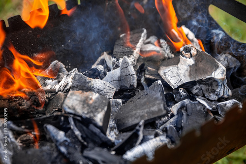 coals burn in the grill