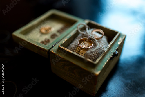 wooden box with rings © Maksim