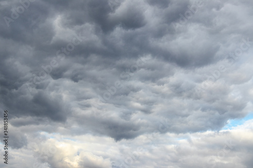 Gray stormy sky with dramatic clouds, sky during a cyclone