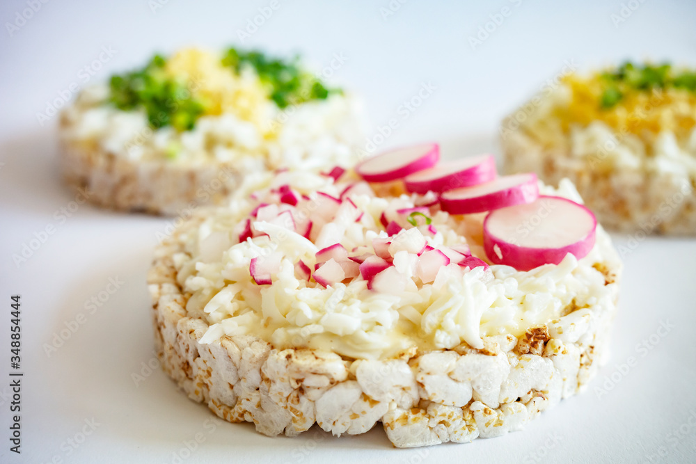 delicious appetizer of rice waffles, eggs and radishes delicious appetizer of rice waffles, eggs and radishes
