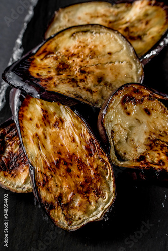 Eggplant grill grilled black background kitchen cooking topping top view