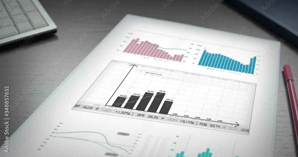 Financial data appear digitally on paper lying on an office table Financial data appear digitally on paper lying on an office table