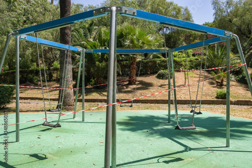 Closed empty playground due to quarantine COVID-19 Coronavirus in Italy