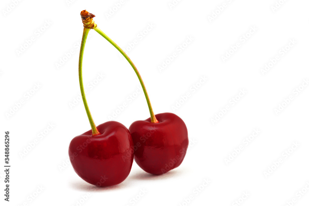 Lecker Kirschen liegen vor weißem Hintergrund Lecker Kirschen liegen vor weißem Hintergrund