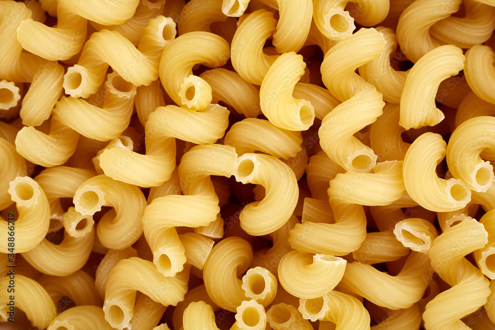 Classic durum wheat pasta isolated on white background. Food and drink concept - various uncooked pasta on white background. Variety of types and shapes of dry Italian pasta Classic durum wheat pasta isolated on white background. Food and drink concept - various uncooked pasta on white background. Variety of types and shapes of dry Italian pasta