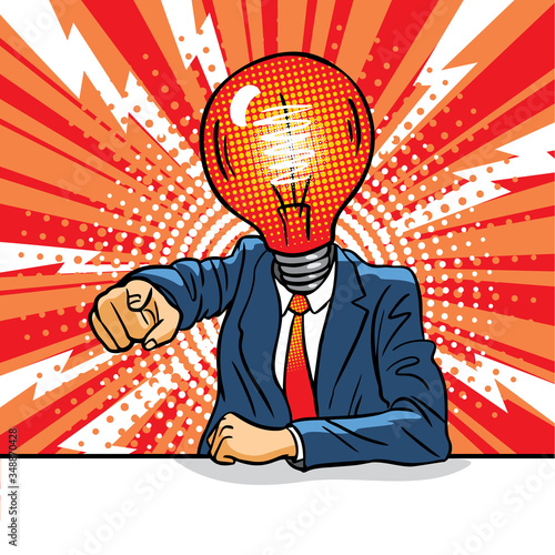 Business man with idea light bulb head concept. An angry man in a business suit sits at a table and points a finger. Bad idea