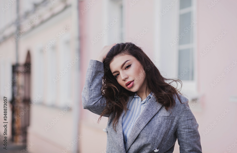 confident girl in an elegant jacket
