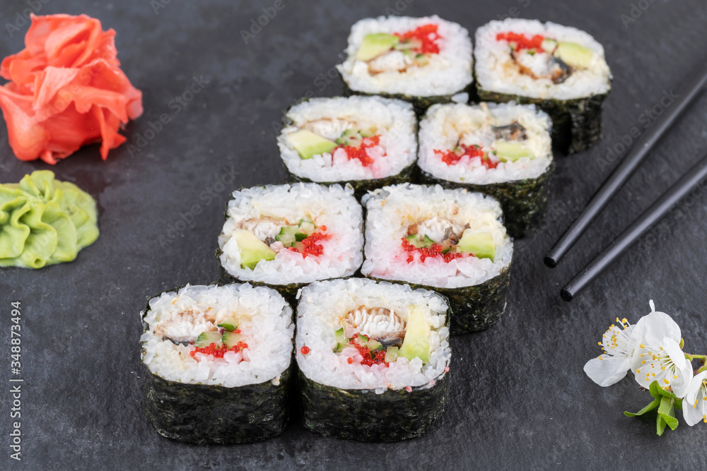 Sushi roll sushi with prawn, avocado, cream cheese, sesame. Sushi menu. Japanese food. Sushi roll sushi with prawn, avocado, cream cheese, sesame. Sushi menu. Japanese food.