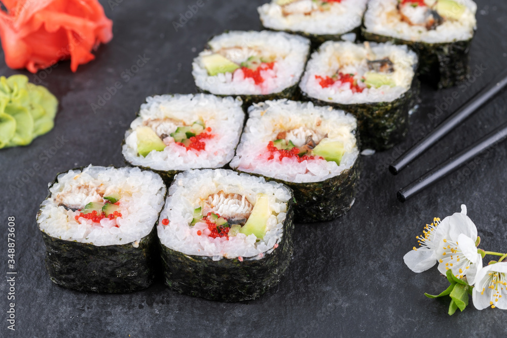 Sushi roll sushi with prawn, avocado, cream cheese, sesame. Sushi menu. Japanese food. Sushi roll sushi with prawn, avocado, cream cheese, sesame. Sushi menu. Japanese food.