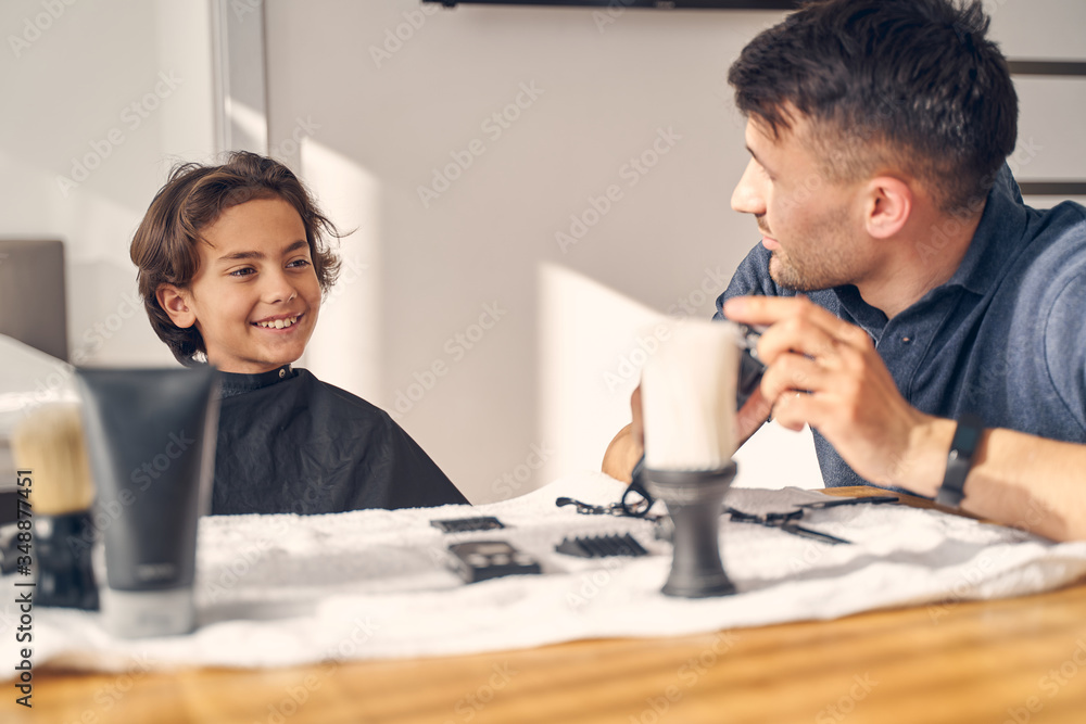 Two Caucasian people having nice conversation at home Two Caucasian people having nice conversation at home