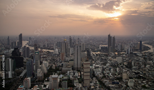 panoramic skyline of Bangkok at sunset from King Power Mahanakhon, Bangkok, Thailand