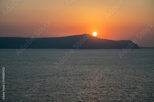  Santorini sunset from Fira  capital of the Greek Aegean island  Greece