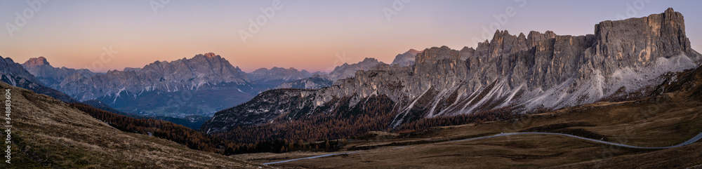 Italian Dolomites mountain peaceful evening dusk panorama from Giau Pass. Picturesque climate, environment and travel concept scene.