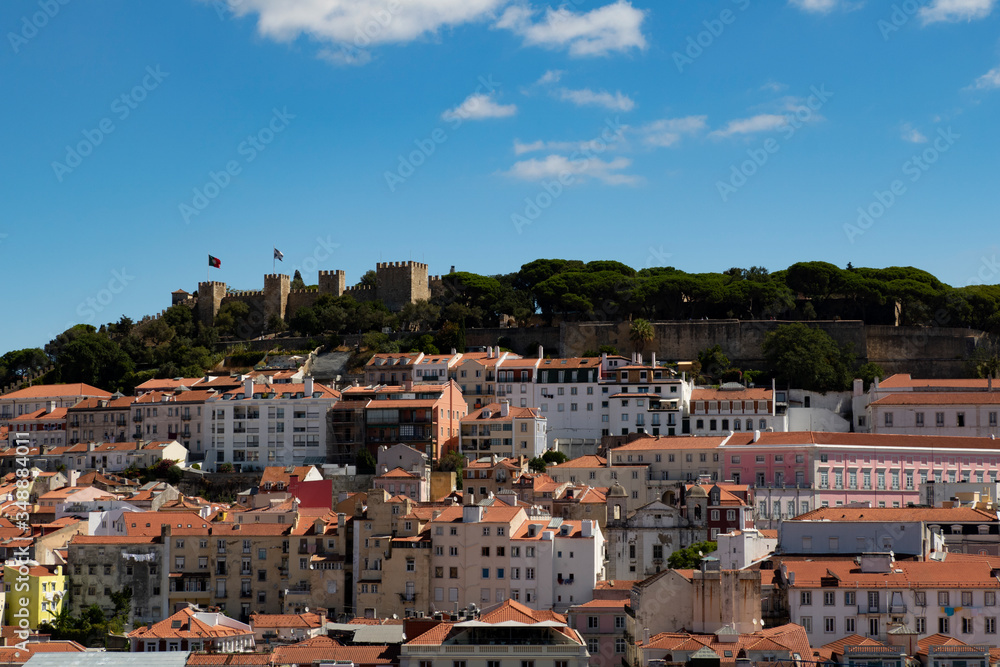 A view of a Lisbon skyline and dense old city center in late summer as seen from the top of a tower, Portugal.