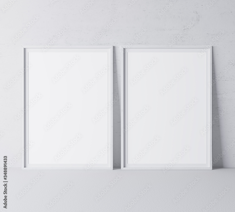 White minimal frame design on gray background, two vertical frames White minimal frame design on gray background, two vertical frames