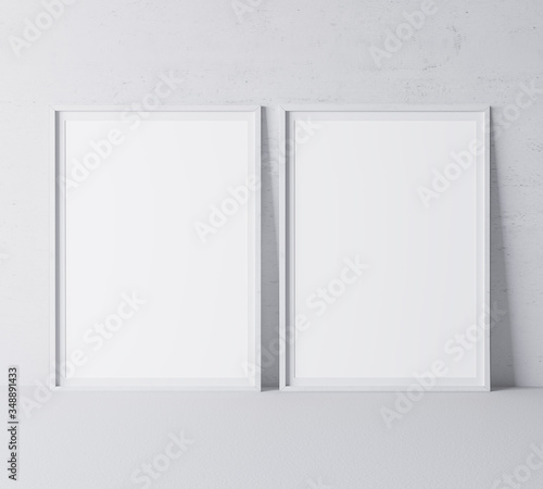 White minimal frame design on gray background, two vertical frames