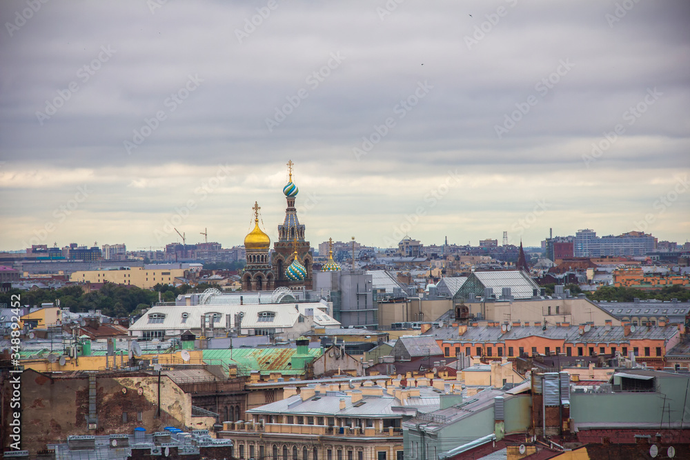 View from the Colonnade of the Saint Isaac's Cathedral in St. Petersburg, Russia, roofs and the Savior on blood and the doms of the Savior on blood cathedral