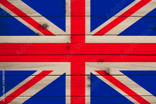 photo of the beautiful colored national flag of the modern state of Great Britain on textured fabric, concept of tourism, economics and politics, close-up